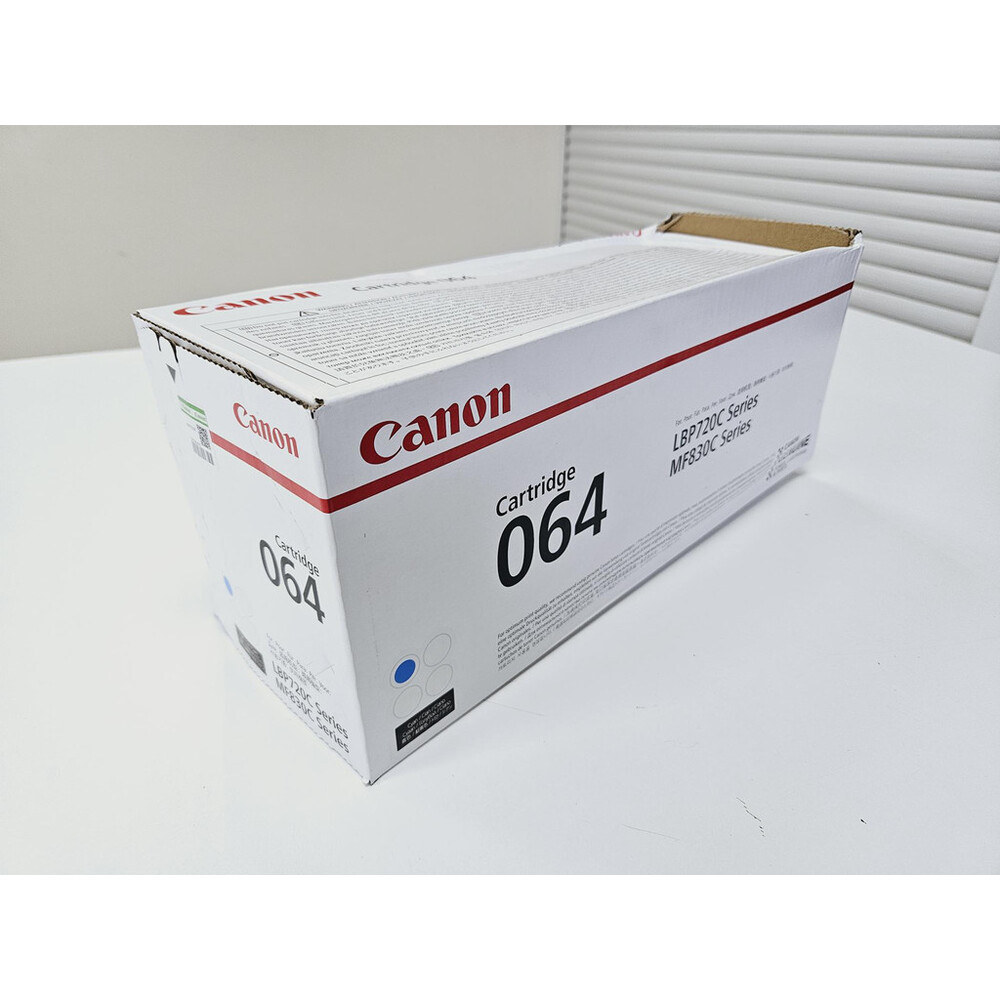 1707301173 Canon 064 Cyaan 5.000 pagina`s - DOOS BESCHADIGD - Afbeelding 1
